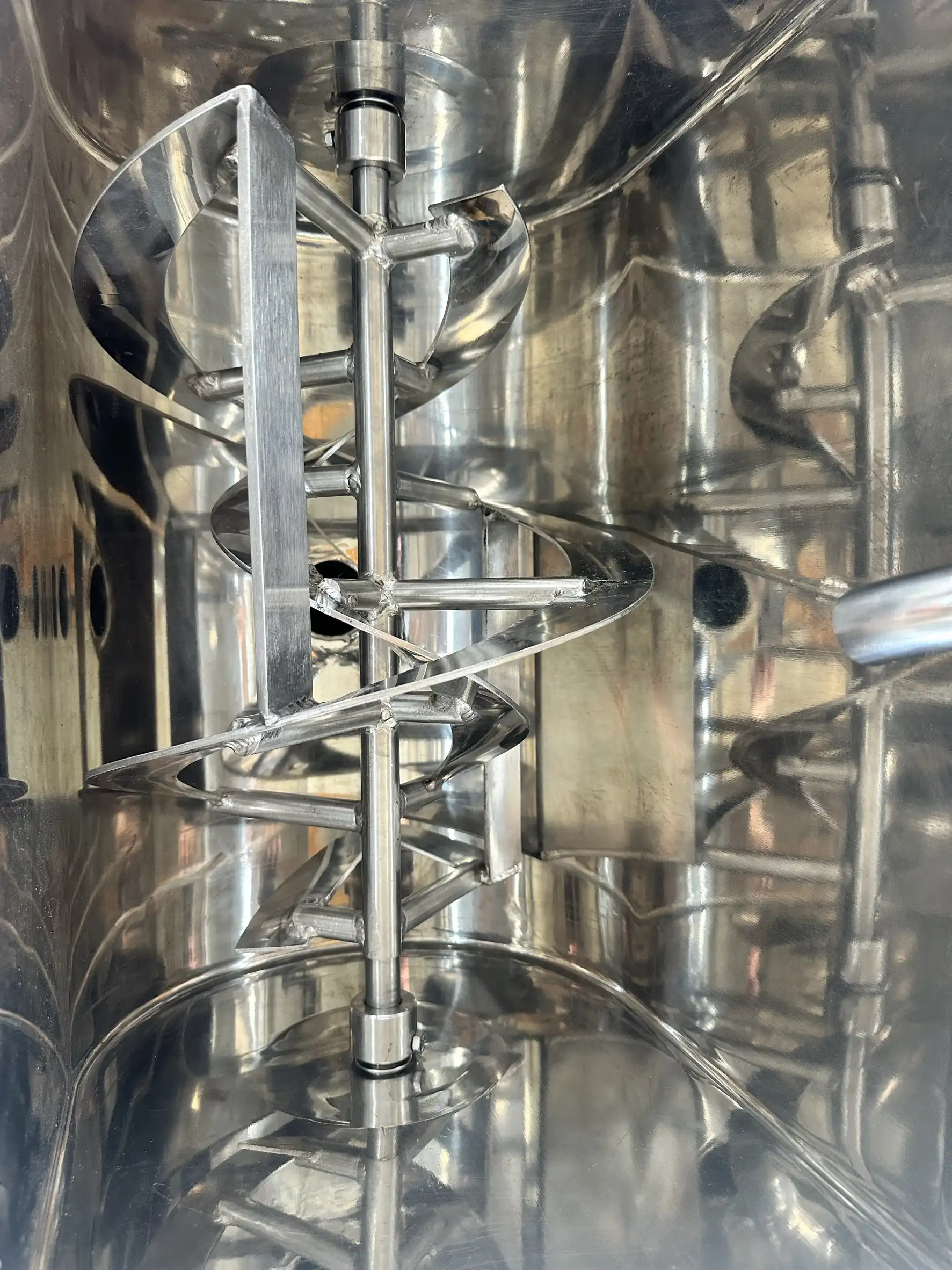Intermediate material tank design